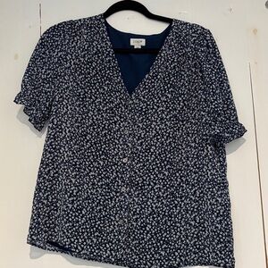 Blue and white floral blouse